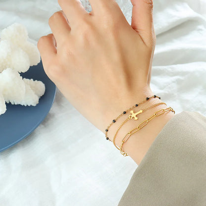 Minimalist Titanium Steel Three-Layered Chain and Bead Bracelet for Women.