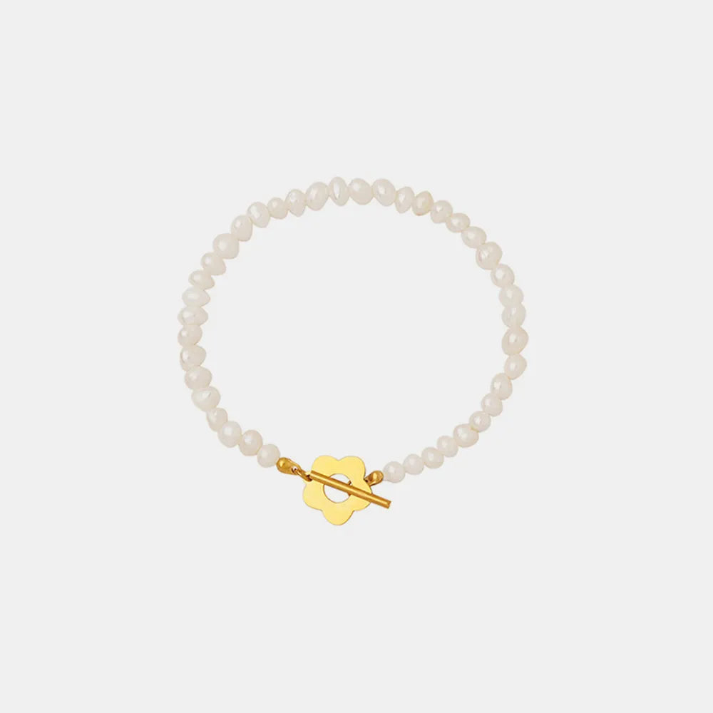 Delicate Women's Titanium Steel Pearl Flower Charm Bracelet.