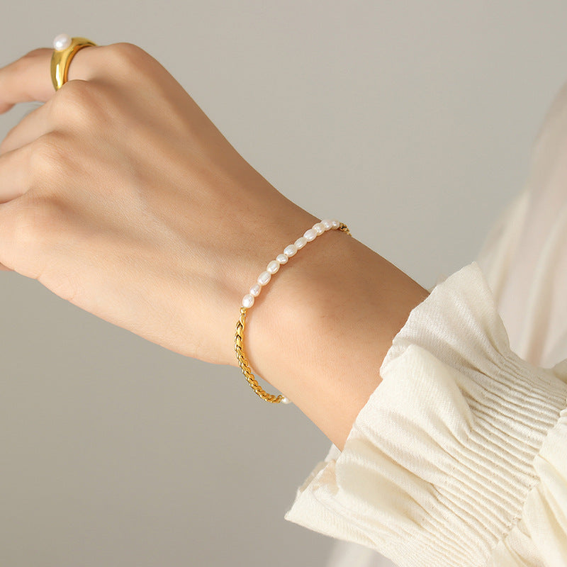Luxury Women's Titanium Steel Stacked Bracelet with Delicate Pearl Strands.